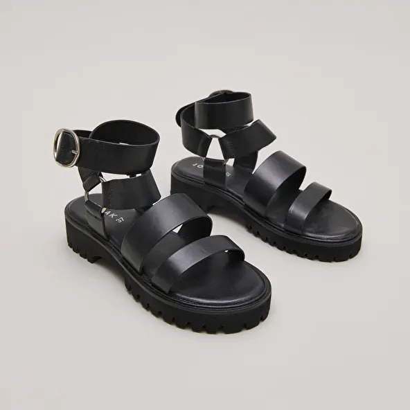 Platform sandals with buckles in black leather