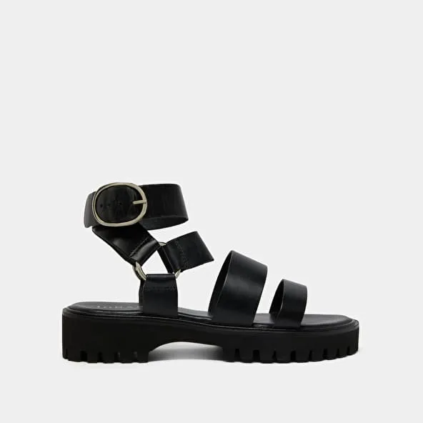 Platform sandals with buckles in black leather