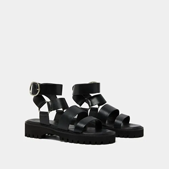 Platform sandals with buckles in black leather