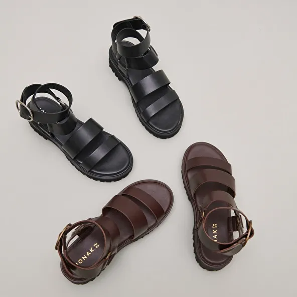 Platform sandals with buckles in black leather