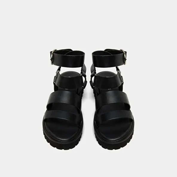 Platform sandals with buckles in black leather